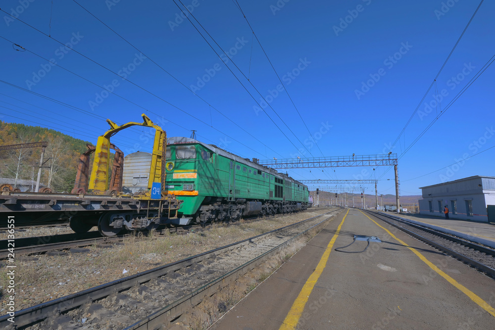 Trans Siberian railway track platform view and blue sky, Russia