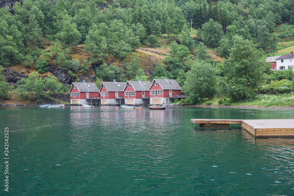 Naklejka premium Boathouses at the Auerlandsfjord in Flam.