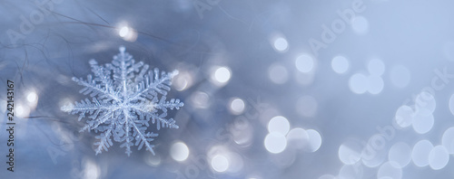 natural snowflakes on snow, photo real snowflakes. Winter snow background. Snowflake Closeup. Macro photo. Copy space.