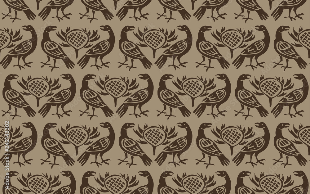 Fototapeta Seamless woodblock printed indigo dye ethnic pattern. Traditional European folk motif with ravens and thistles, taupe brown on beige background. Textile or wallpaper print.