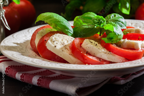 Caprese salad with mozzarella, tomato, basil