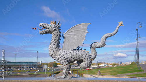 Dragon statue in front of Historic and Architectural Complex of the Kazan Kremlin with blue sky in Kazan Russia