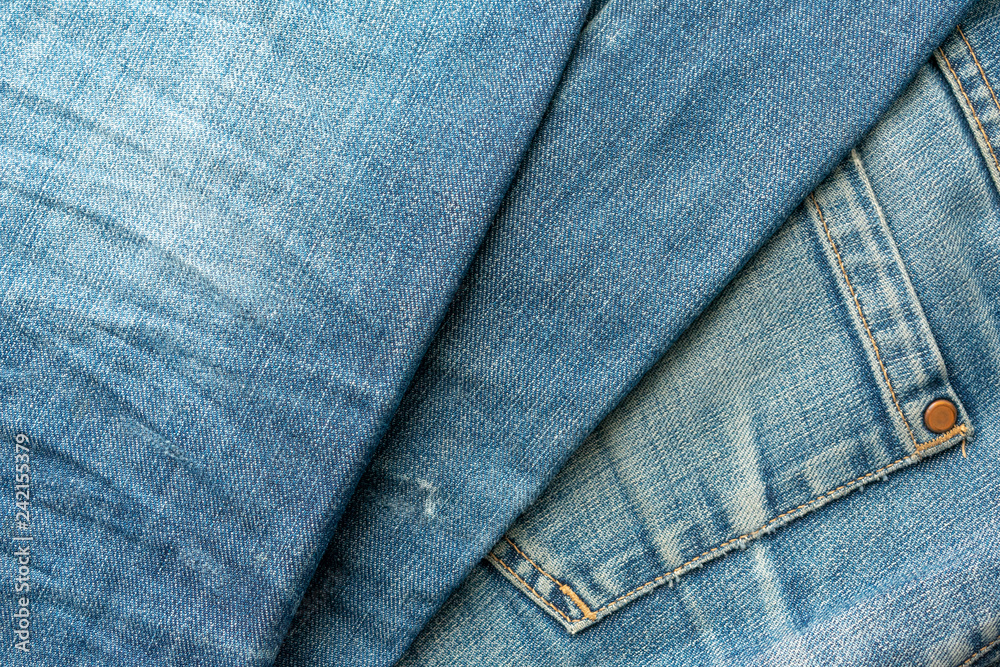 Fototapeta premium Blue jeans pile. Denim Texture.
