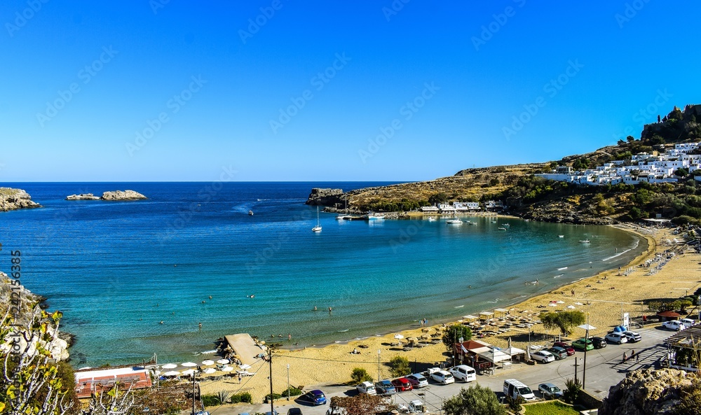 LINDOS,RHODES/GREECE OCTOBER 29 2018 : Lindos bay,photo taken from Kleovoulos Tomb hill.