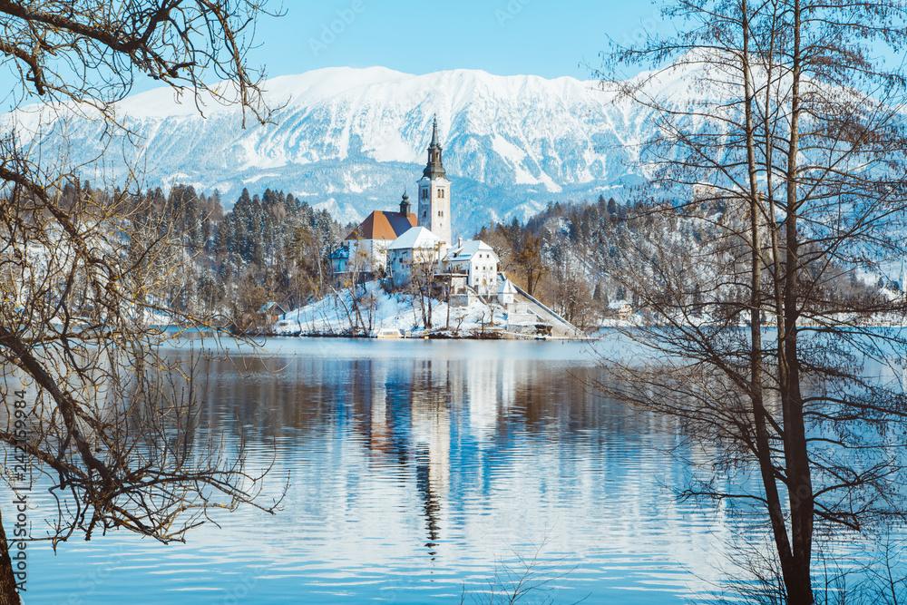 Lake Bled with Bled Island and Castle at sunrise in winter, Slovenia