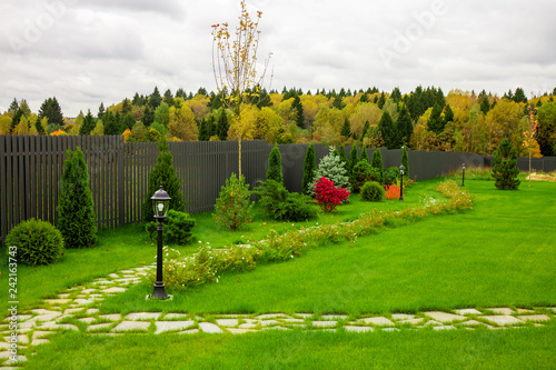 Beautiful garden in front of a villa house