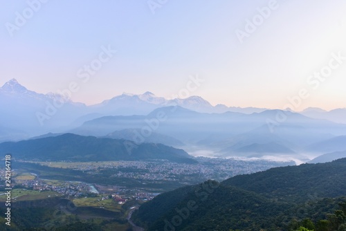 Misty Morning of the Pokhara Valley and the Himalayas Mountain Range
