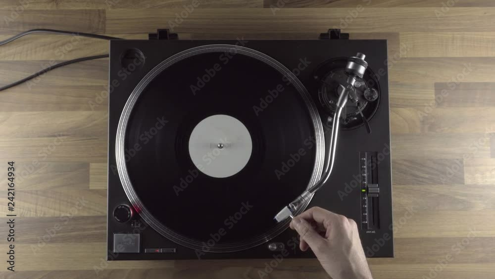spinning vinyl record player. Top down view. Flatlay view. 4K