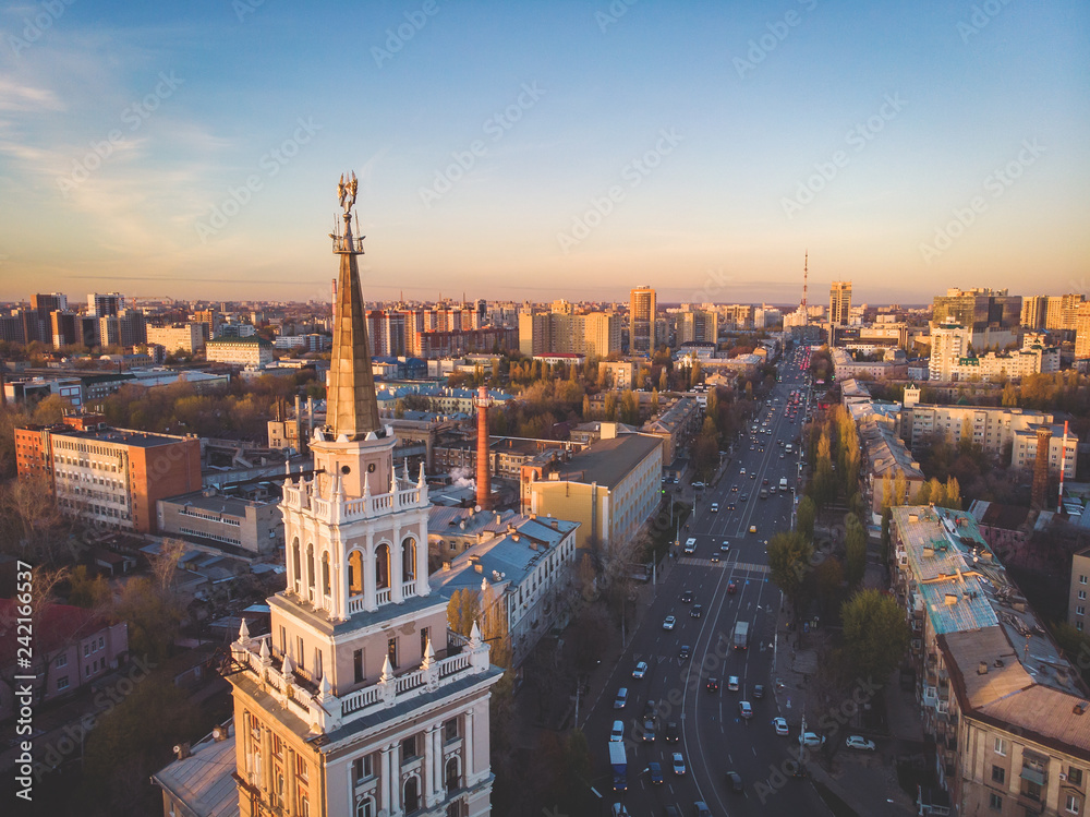 Aerial view of Voronezh road in center of city and historical building on foreground