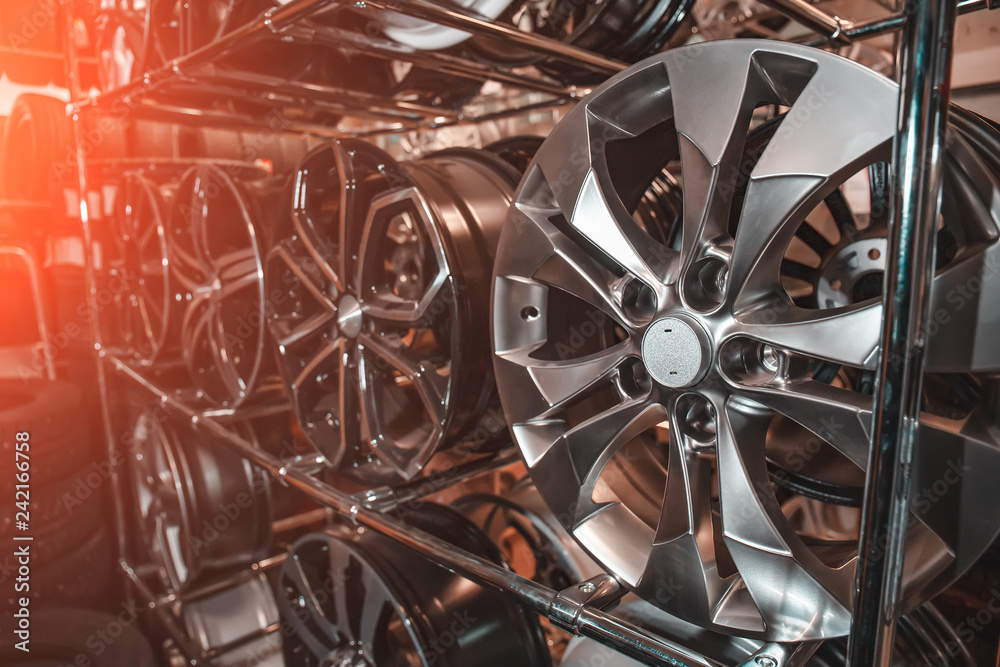 Car Rim Collection Car rims or wheels in store, rows of new alloy automobile disks Stock ...