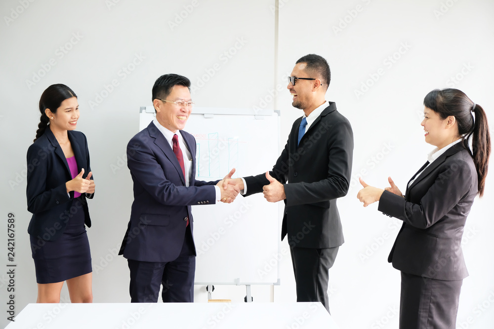 Group of business people stand congratulated. Group of business people stand congratulated.