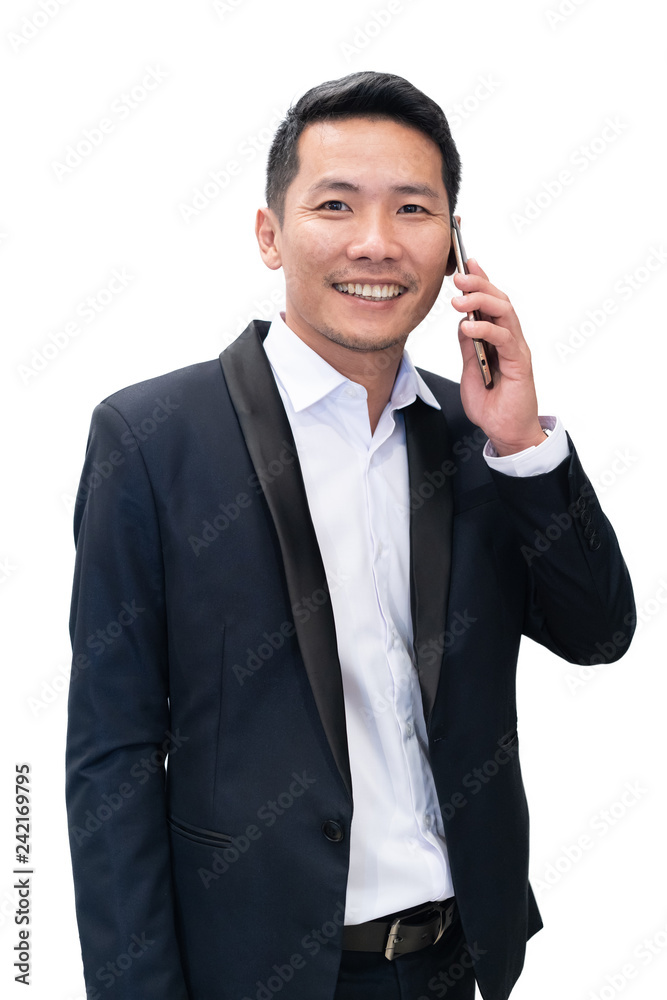 Isolated asian businessman in suit using mobile phone on white background in businesss concept Isolated asian businessman in suit using mobile phone on white background in businesss concept