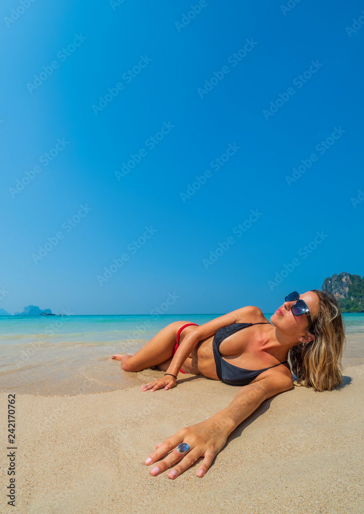 woman resting at the tropical Thailand Railay beach woman resting at the tropical Thailand Railay beach