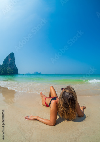 woman resting at the tropical Thailand Railay beach