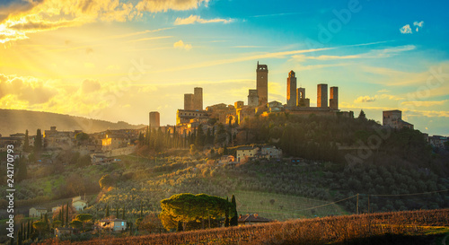 San Gimignano town skyline and medieval towers sunset. Tuscany, Italy photo