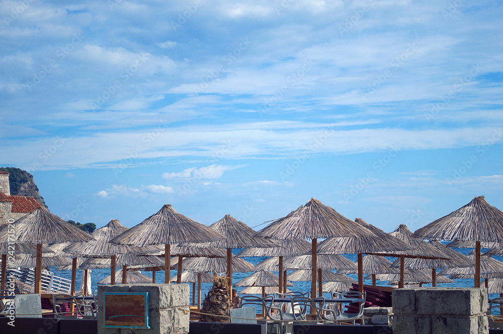 Naklejka premium beach chairs on the beach