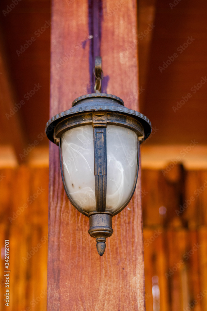 Lamp decorated with pillars