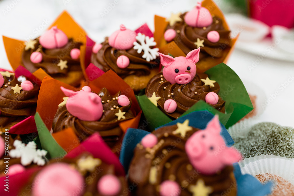 Miss piggy cupcakes - beautiful and delicious cakes decorated with pink cream shaped funny piggy faces, christmas and new year 2019 themed treat for kids party