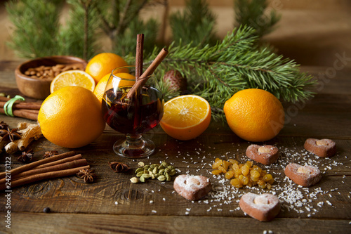 christmas still life with mulled wine and spice and decorations pine twig