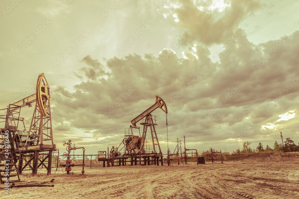 Pump jack. Extraction of oil. Petroleum concept. Pump jack. Extraction of oil. Petroleum concept.