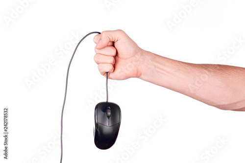 Hand holds mouse over wire on white background photo