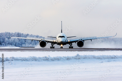 Modern commercial passenger plane on airfield. Jet on runway. Aviation and transportation.
