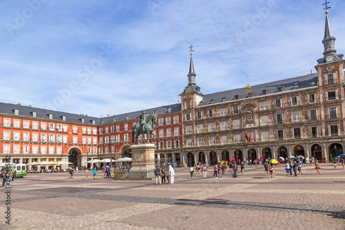 Madrid, Spain. Tourists in the picturesque Plaza Mayor