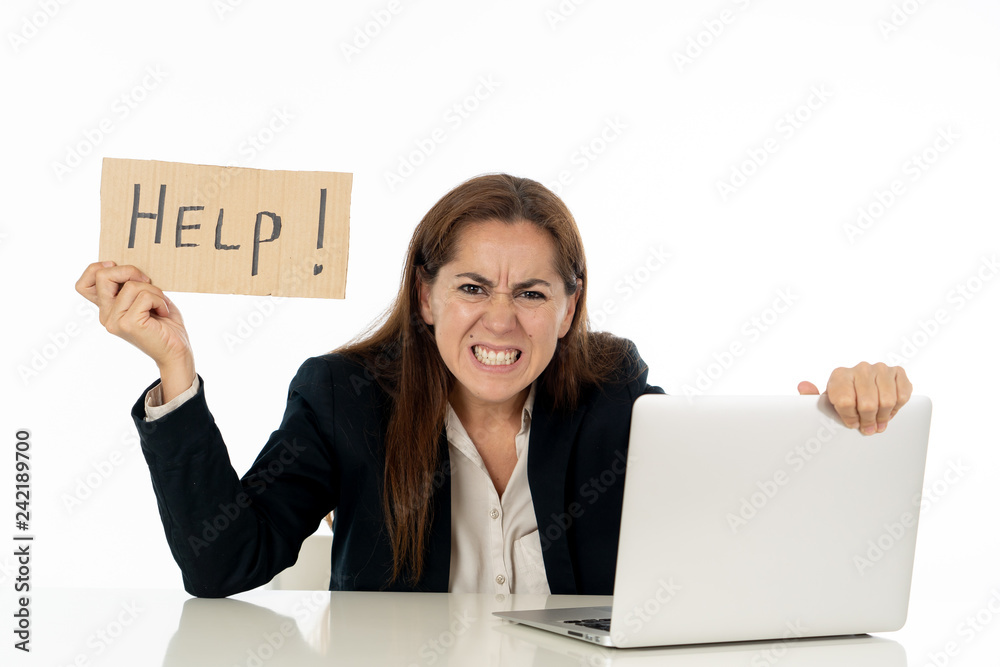 Sad and tired businesswoman holding a help sign feeling helpless and frustrated Sad and tired businesswoman holding a help sign feeling helpless and frustrated