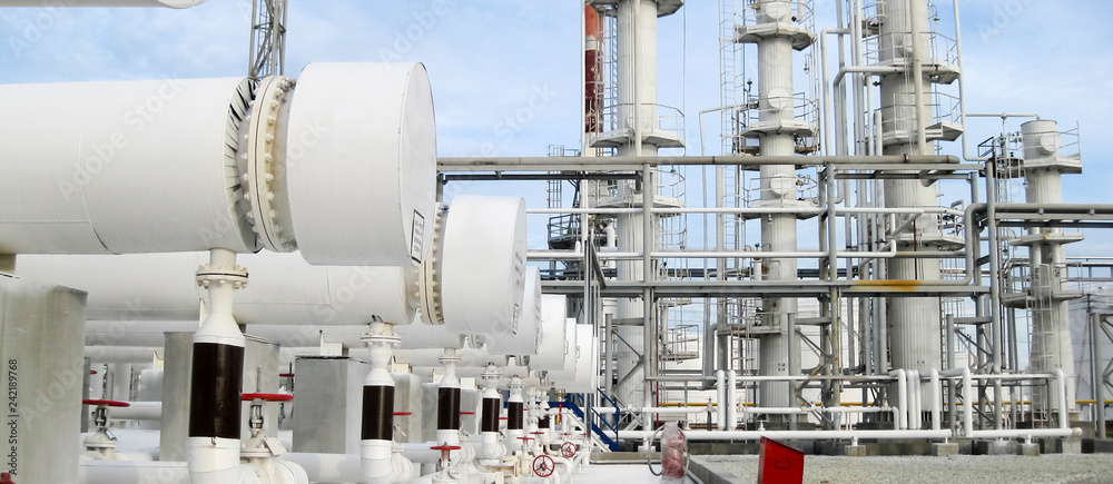 Heat exchangers in a refinery. The equipment for oil refining Heat exchangers in a refinery. The equipment for oil refining