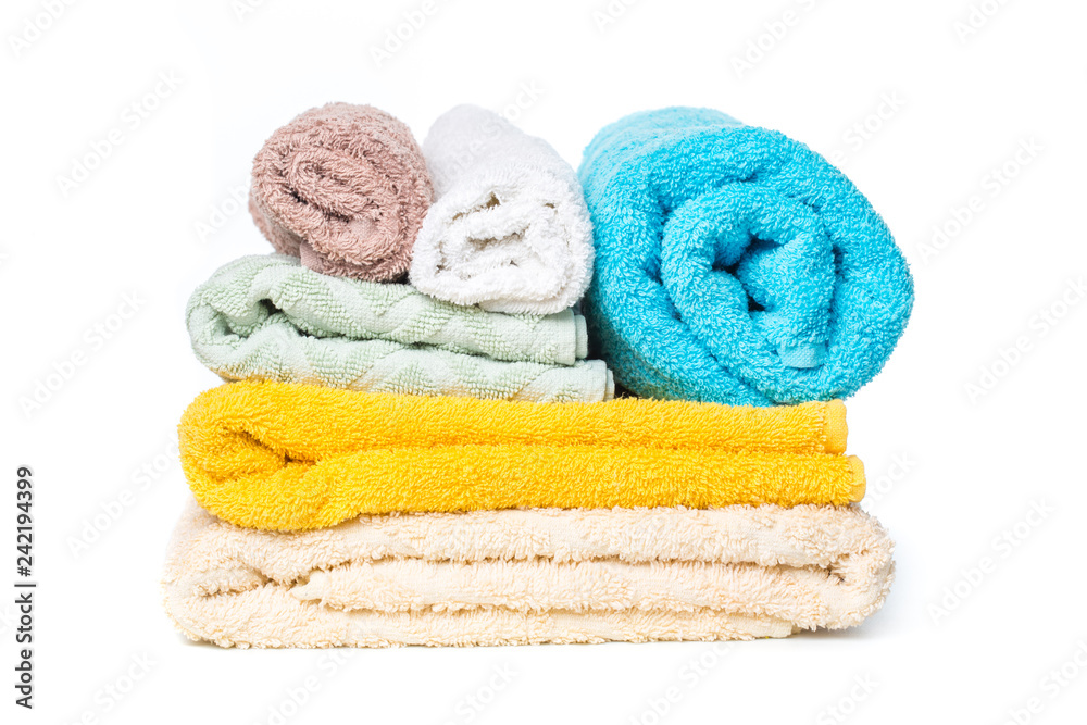 stack of towels isolated on white background. stack of towels isolated on white background.