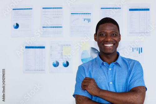 Portrait of laughing african american businessman