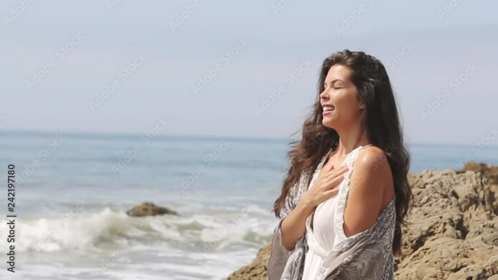 young woman happy at the beach. summer feeling young woman happy at the beach. summer feeling