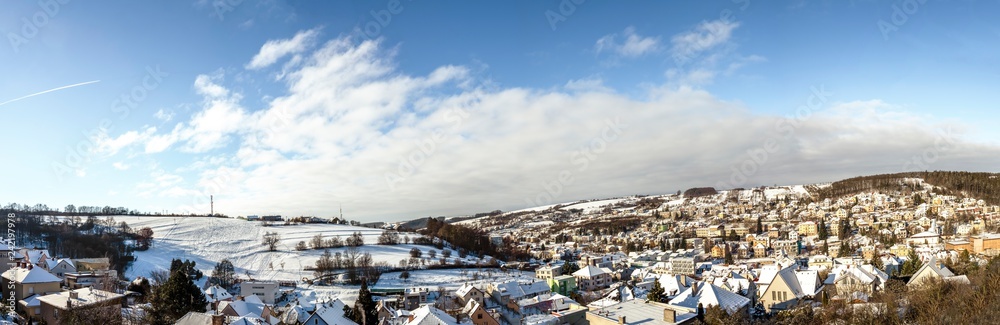 Panoramic view on Czech spa and ski village Luhachovice with mountains and hills with snow ski places for the turists and travellers