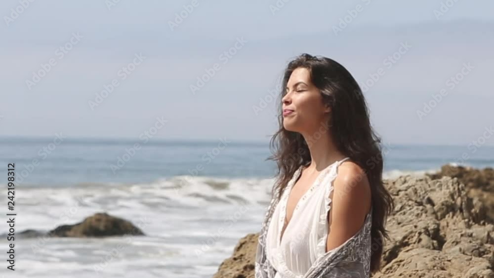 young woman happy at the beach. summer feeling young woman happy at the beach. summer feeling