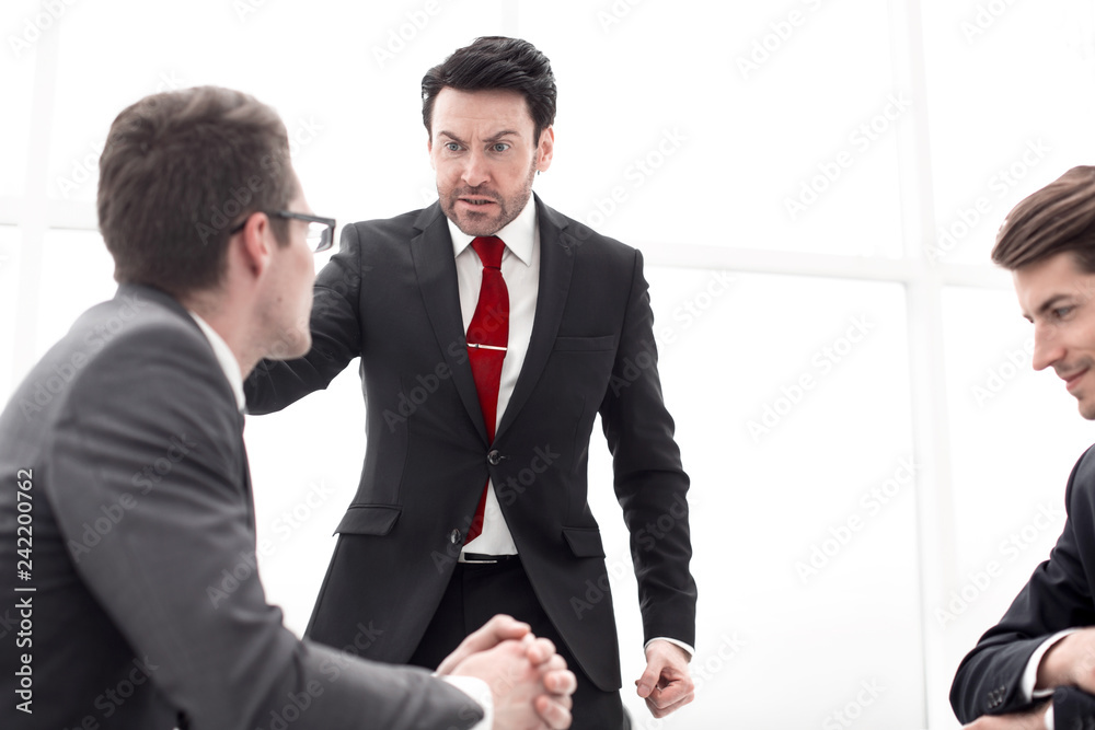 businessman talking with employees at a working meeting businessman talking with employees at a working meeting