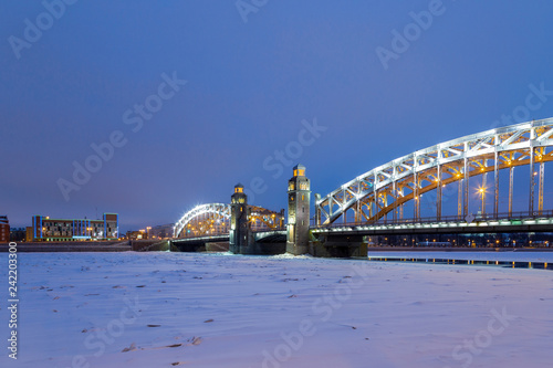 Peter the Great Bridge on the Neva River in Saint Petersburg at night View Bolsheokhtinsky bridge winter night
