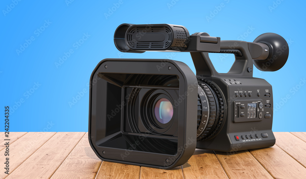 Professional video camera on the wooden table. 3D rendering