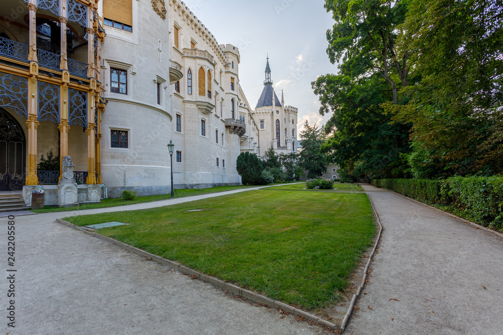 back view of beautiful white renaissance state castle castle Hluboka nad Vltavou, one of most beautiful castles in the Czech Republic back view of beautiful white renaissance state castle castle Hluboka nad Vltavou, one of most beautiful castles in the Czech Republic