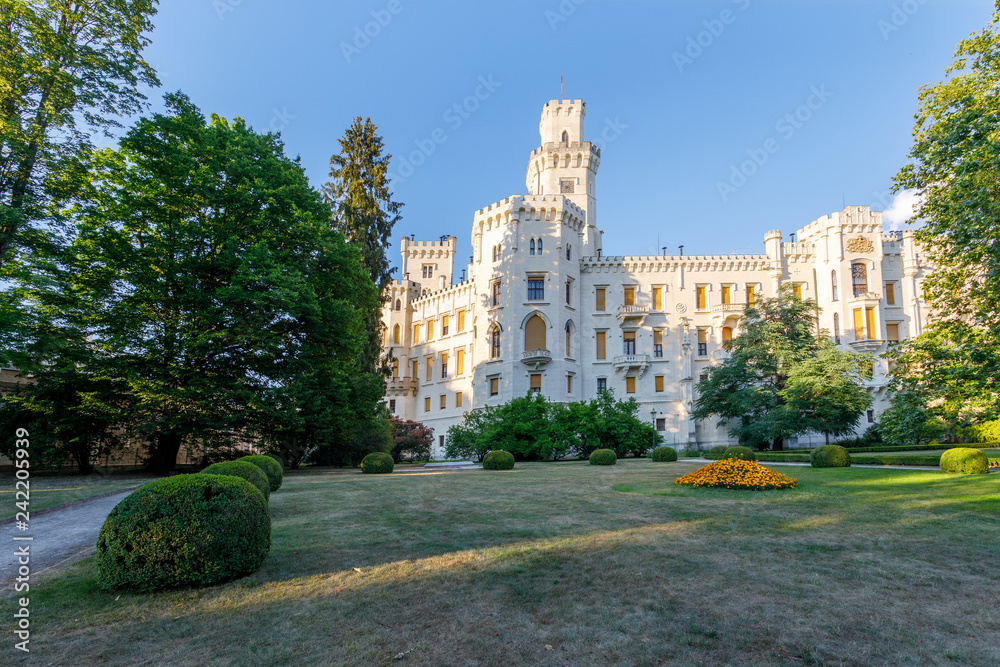 back view of beautiful white renaissance state castle castle Hluboka nad Vltavou, one of most beautiful castles in the Czech Republic