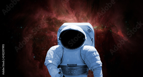 Fototapeta Naklejka Na Ścianę i Meble -  close up astronaut triping through galaxy universe f