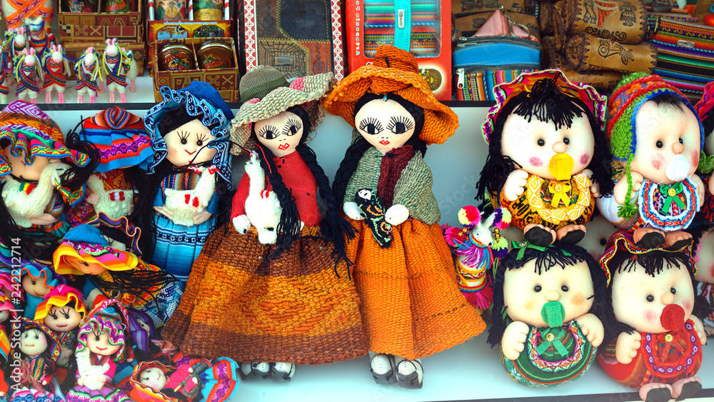 Peruvian dolls sale in souvenir shop of Cusco, Peru. Handmade. Close up souvenirs of Peru, in a traditional market. Selective focus