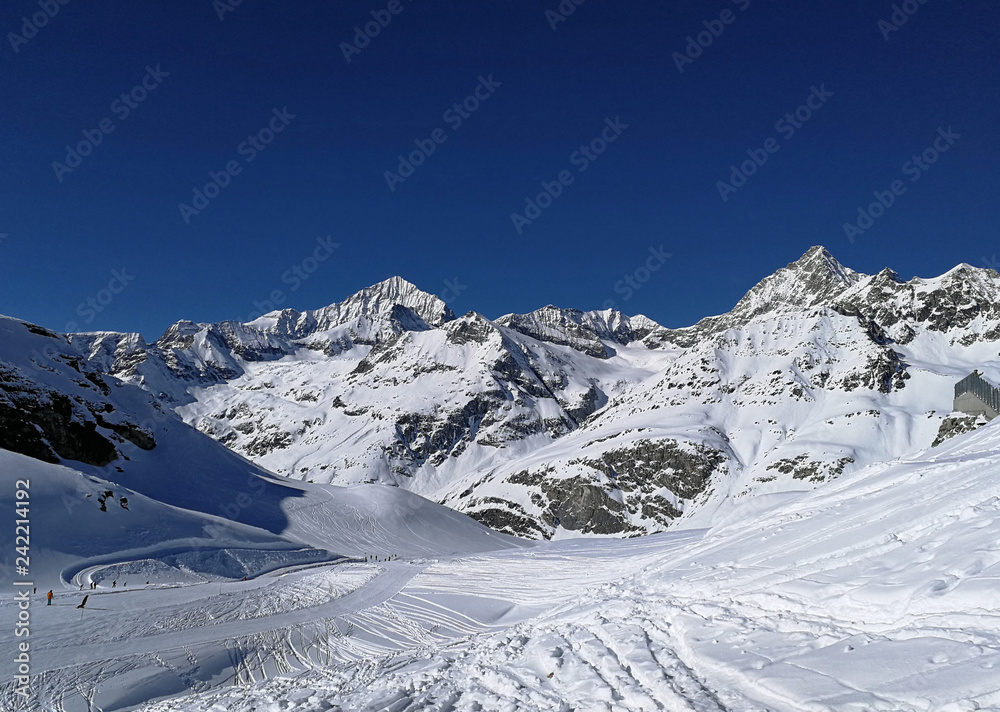 Ski slopes and snow-capped mountains in Zermatt, in canton of Wallis, Switzerland.