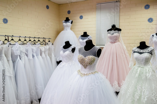 A huge selection of wedding dresses in the wedding salon.