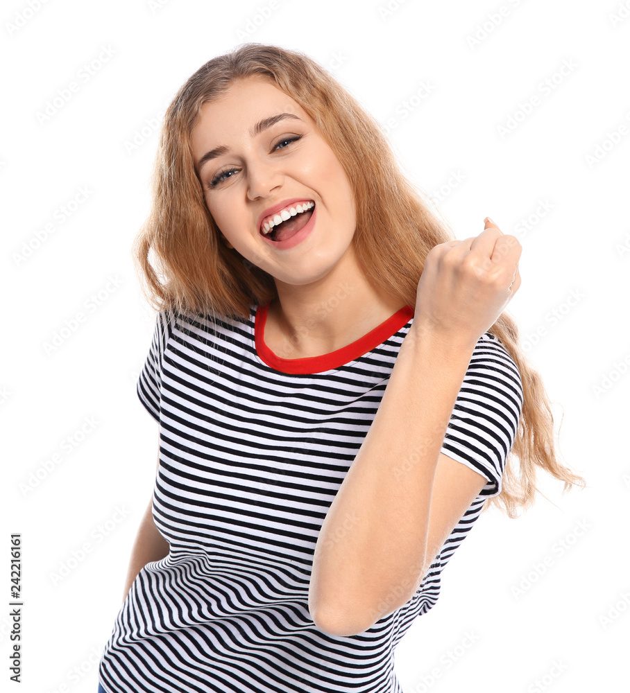 Happy young woman celebrating victory on white background Happy young woman celebrating victory on white background