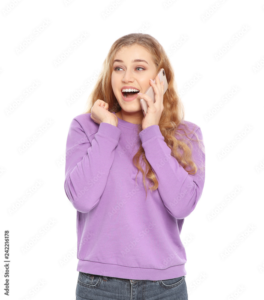 Happy young woman with smartphone celebrating victory on white background Happy young woman with smartphone celebrating victory on white background