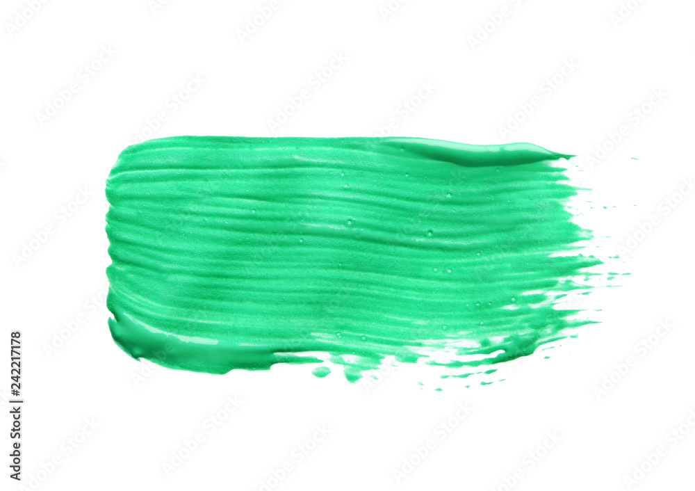 Abstract brushstroke of green paint isolated on white