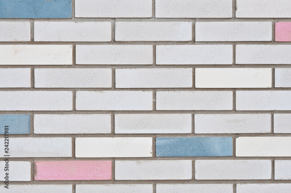 Brick wall with colored bricks. City backgrounds. Brick wall with colored bricks. City backgrounds.