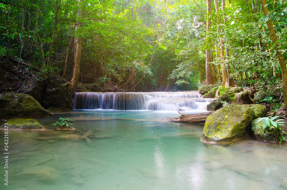 Naklejka premium waterfall in deep forest , thailand