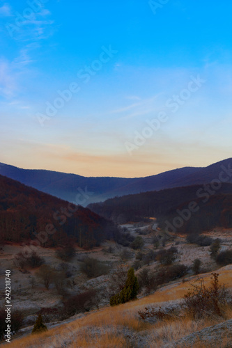 Landscape with mountains and trees a winter breakfast. Based on the beautiful colors of the sunrise