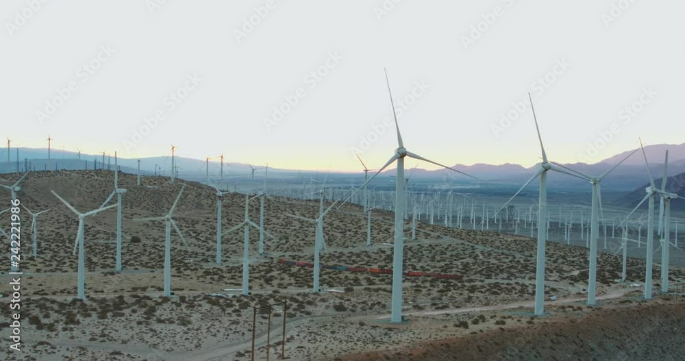 Wind Turbine Farm in the Desert at Sunrise Aerial Wind Turbine Farm in the Desert at Sunrise Aerial